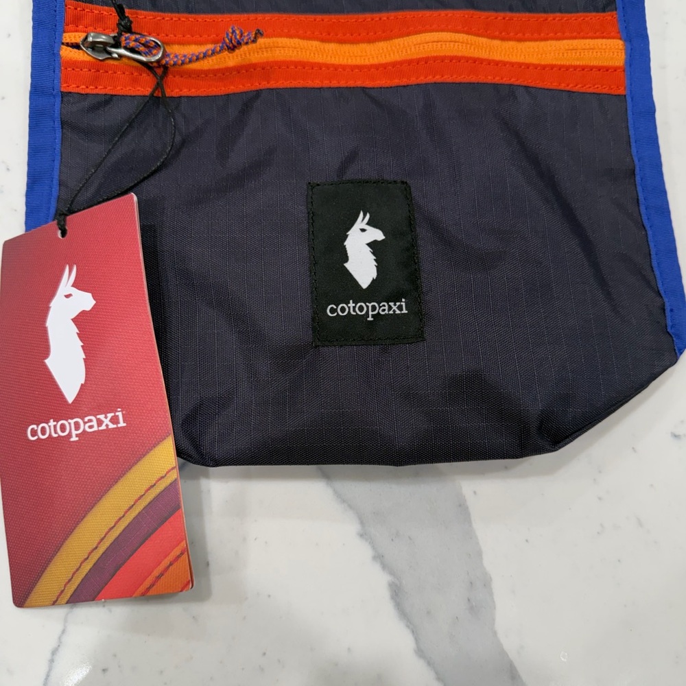 Cotopaxi Colorful Travel Pouch with Orange and Blue